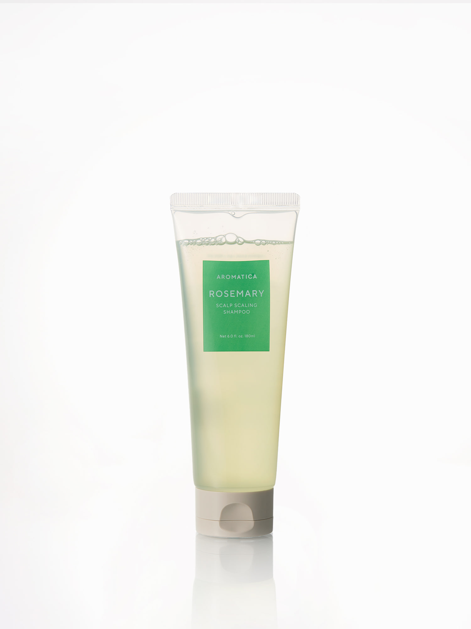 로즈마리 스칼프 스케일링 샴푸 제품 팩샷 흰 배경에 놓인 투명 튜브형 AROMATICA Rosemary Scalp Scaling Shampoo