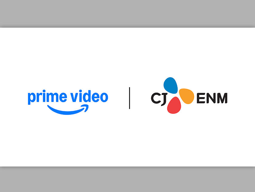 Prime Video–CJ ENM 전략적 파트너십 Prime Video와 CJ ENM 로고가 세로선으로 나란히 표시된 협력 발표 그래픽