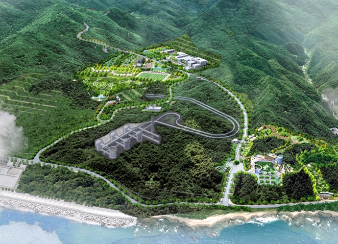 경주 방폐장의 지상 시설과 산지 내부 처분 구역을 표현한 조감도 해안 산지에 조성된 방사성 폐기물 처분시설 조감도